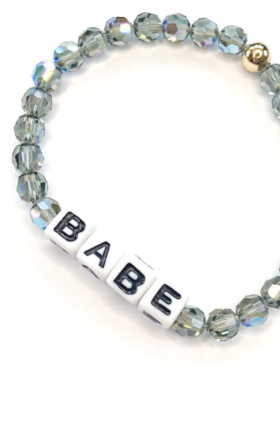 THE SMALL GRAY SWAROVSKI CRYSTAL WITH "BABE" BLOCK LETTERS BRACELET