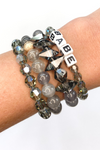 THE SMALL GRAY SWAROVSKI CRYSTAL WITH "BABE" BLOCK LETTERS BRACELET