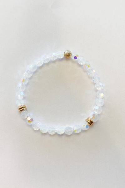 THE SMALL CLEAR SWAROVSKI CRYSTAL WITH GOLD DISCS BRACELET