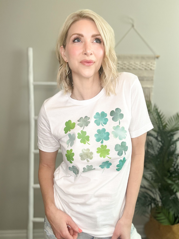 FIELD OF WATERCOLOR CLOVERS GRAPHIC TEE