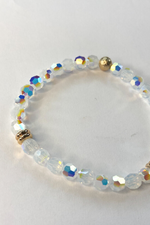 THE SMALL CLEAR SWAROVSKI CRYSTAL WITH GOLD DISCS BRACELET