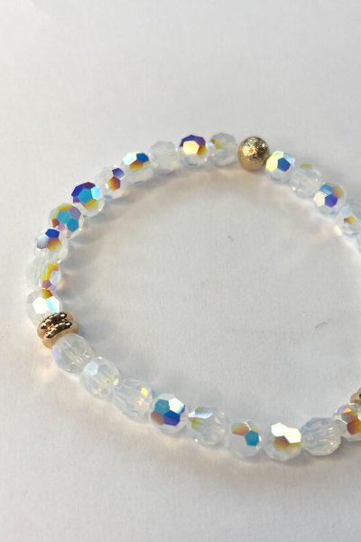 THE SMALL CLEAR SWAROVSKI CRYSTAL WITH GOLD DISCS BRACELET